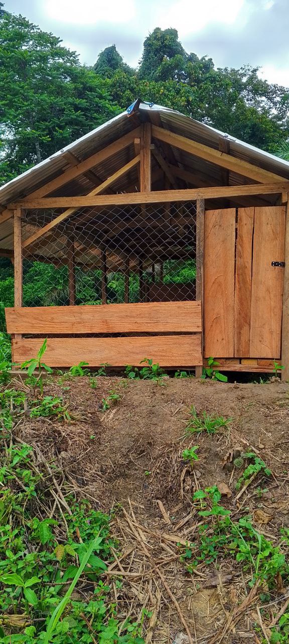Long side view of the completed goat pen