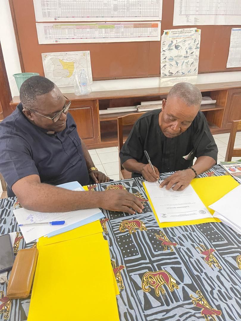 NACRUDI CEO/Founder Mr Ekpo Peter signing a collaborative management agreement with PSMNR
