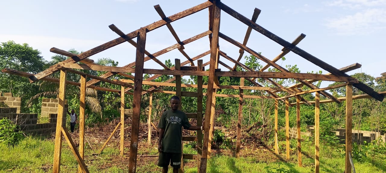 Timber frame of a poultry house under construction